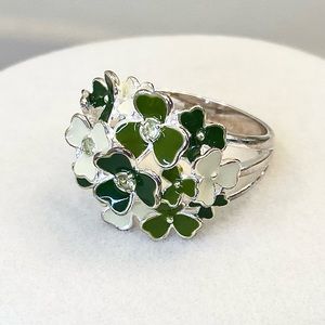 Sterling silver enameled and crystal shamrock floral cluster dome ring.